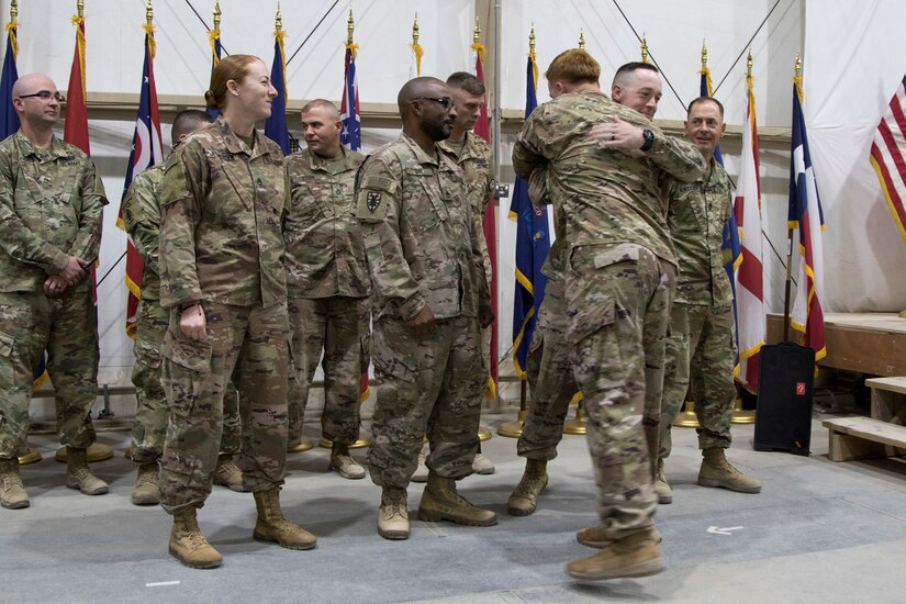 Instructors from the U.S. Army Central Noncommissioned Officer Academy congratulate U.S. Army Soldiers graduating from the latest Basic Leader Course held at Camp Buehring, Kuwait, Oct. 17, 2018. Completing BLC is an essential task which prepares Soldiers to be more capable noncomissioned officers.