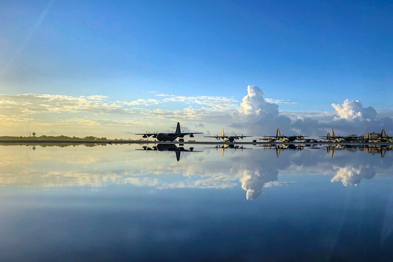 Military aircraft parked on an airfield