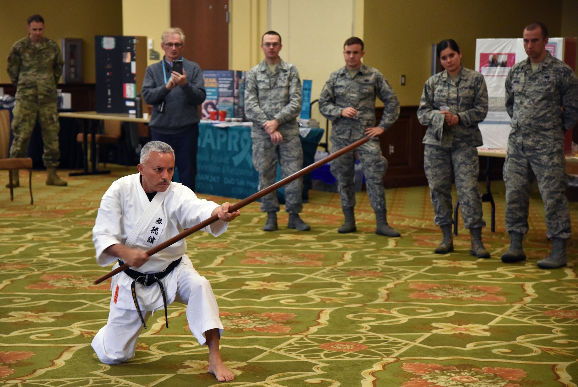 Alfred Rivera, Okinawa Kenpo Mushin Ryu instructor, provides a karate demonstration during Diversity Day inside the Bay Breeze Event Center at Keesler Air Force Base, Mississippi, Nov. 13, 2018. The celebration also included food sampling and information booths about countries around the world. (U.S. Air Force photo by Kemberly Groue)