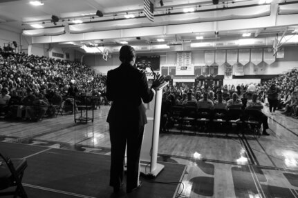 U.S. Army Reserve Brig. Gen. Kris. A. Belanger, Commanding General, 85th Support Command, gives remarks during the Elk Grove High School Veterans Day ceremony, Nov. 9, 2018.