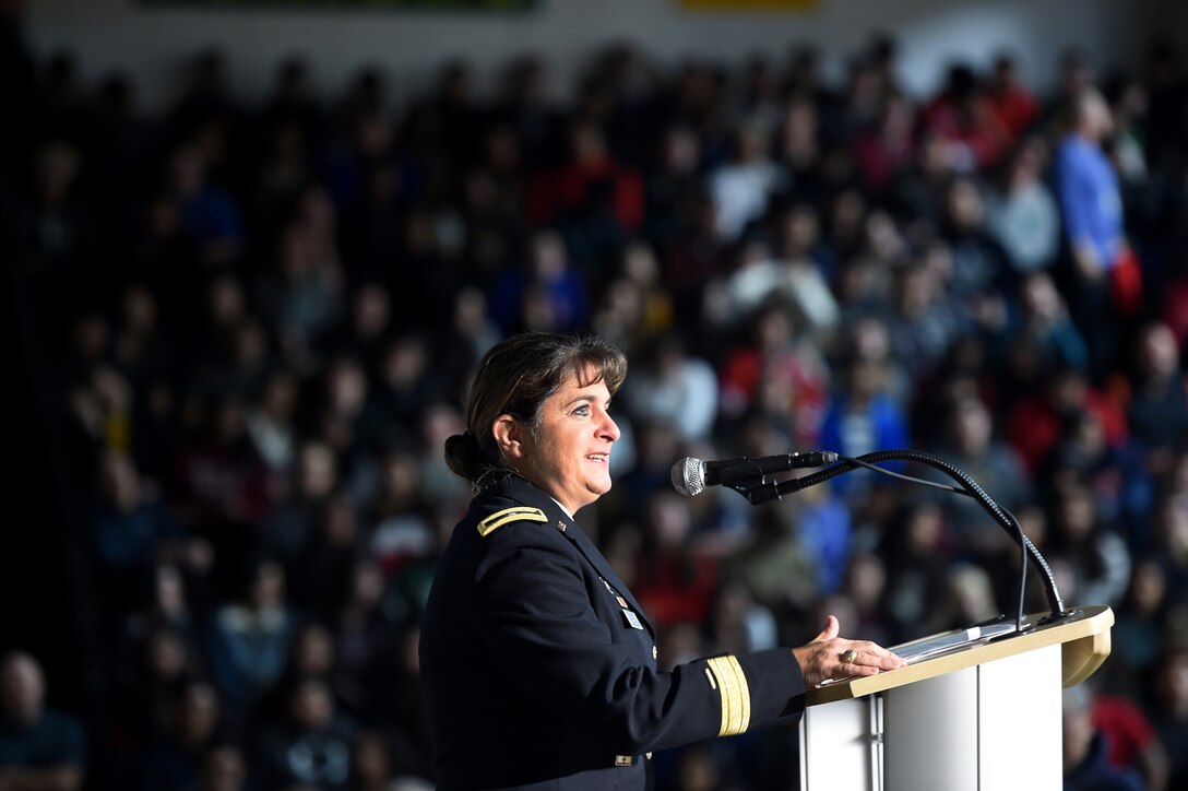 U.S. Army Reserve Brig. Gen. Kris. A. Belanger, Commanding General, 85th Support Command, gives remarks during the Elk Grove High School Veterans Day ceremony, Nov. 9, 2018.