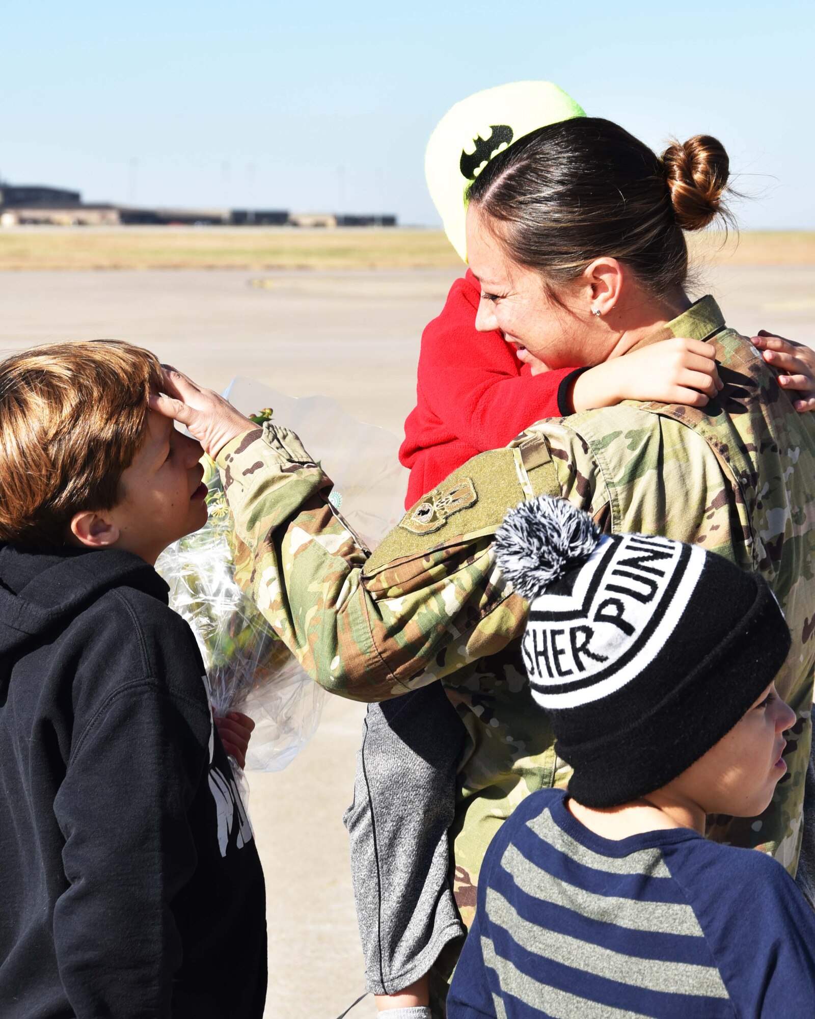 Master Sgt. Jennifer Bilby, 931st Operations Support Squadron Intelligence NCOIC, greets her family after returning from a recent deployment Nov. 15, 2018, McConnell Air Force Base, Kan. More than 35 members of the 931 ARW returned from a deployment to Turkey.