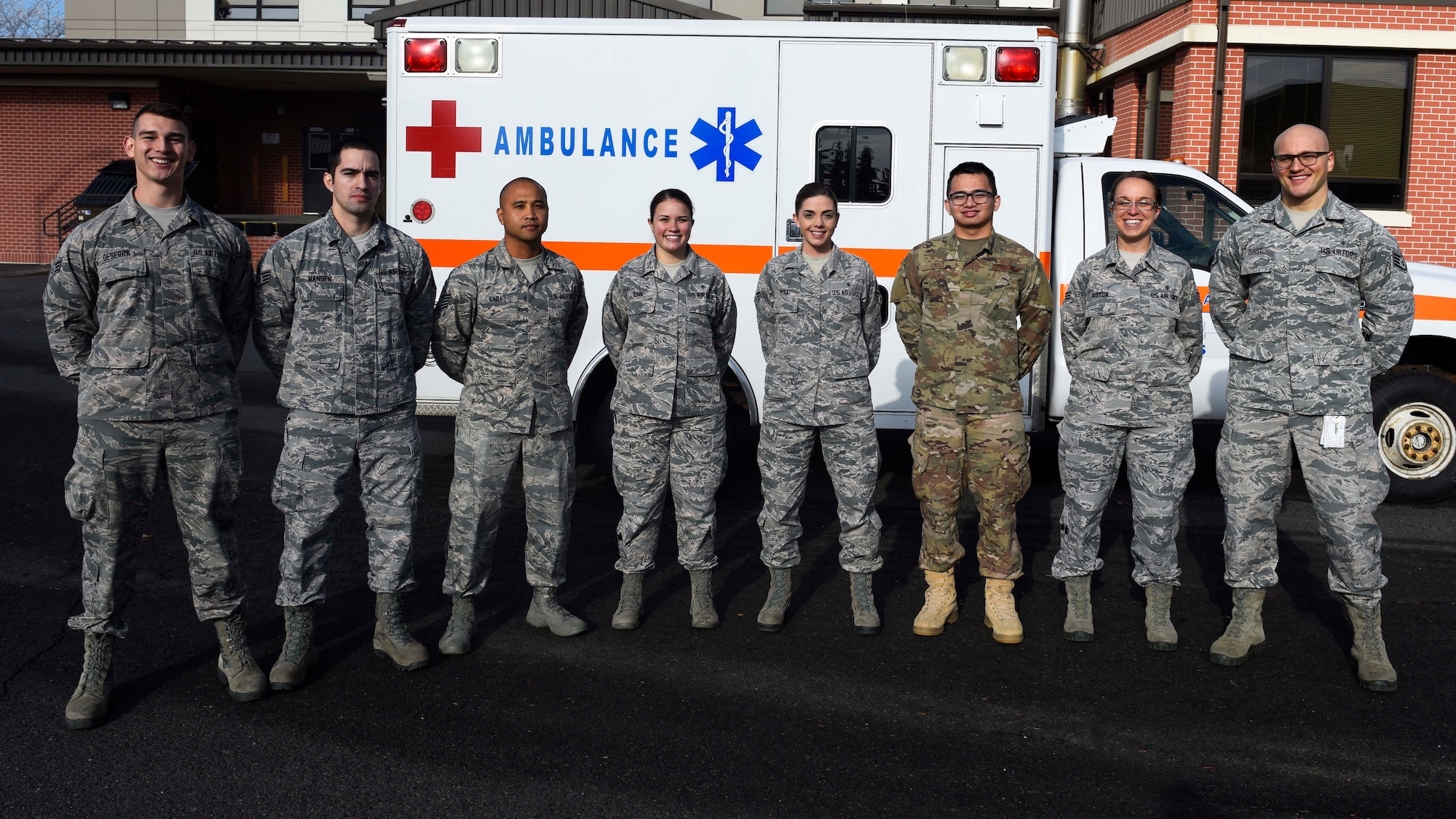 Airmen from the 92nd Medical Operation Squadron medical team pose for a photo at Fairchild Air Force Base, Washington, Nov. 13, 2018. The medical team responded to a respiratory distress call at the commissary on base, providing first aid care and saving a man’s life. (U.S. Air Force photo/Airman 1st Class Lawrence Sena)