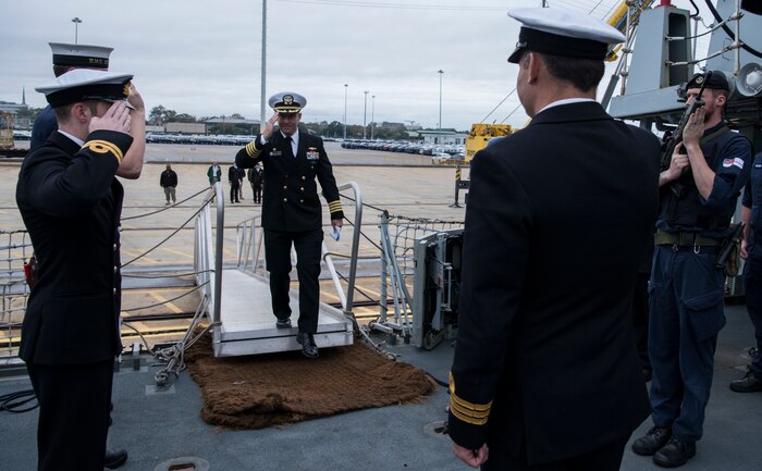 U.S. Navy Capt. Kevin Byrne, Joint Base Charleston deputy commander, walks aboard the HMS Monmouth during the ship’s visit Nov. 8-12, 2018, at the Port of Charleston. The British Royal Navy ship hosted several events throughout Veterans Day weekend engaging with Charleston's military and civilian leadership.