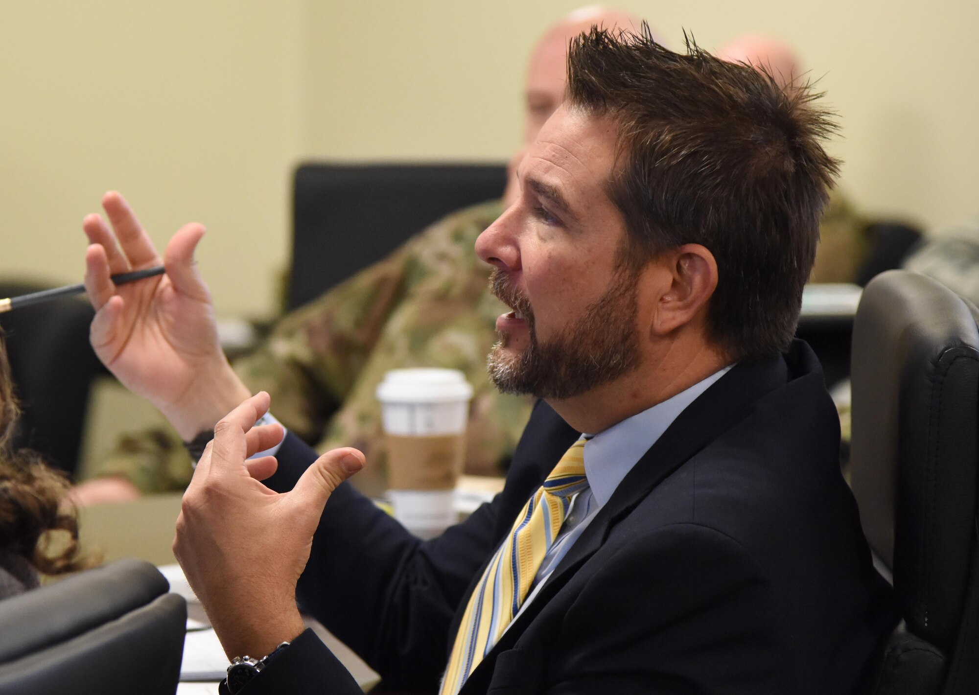 Paul Jackson, 315th Training Squadron chief of training development, Goodfellow Air Force Base, Texas, asks questions during an 81st Training Support Squadron briefing at Keesler Air Force Base, Mississippi, Nov. 13, 2018. Personnel from Goodfellow AFB and Vandenberg AFB, California, visited squadrons within the 81st Training Group to review methodologies currently being used in the 81st TRG course curriculum. (U.S. Air Force photo by Kemberly Groue)