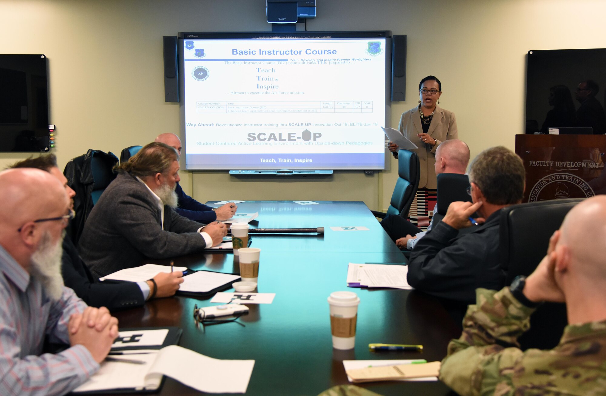 Lisa Rich, 81st Training Support Squadron curriculum developer manager, briefs on student-centered active learning environment with upside-down pedagogies at Keesler Air Force Base, Mississippi, Nov. 13, 2018. Personnel from Goodfellow AFB, Texas, and Vandenberg AFB, California, visited squadrons within the 81st Training Group to review methodologies currently being used in the 81st TRG course curriculum. (U.S. Air Force photo by Kemberly Groue)