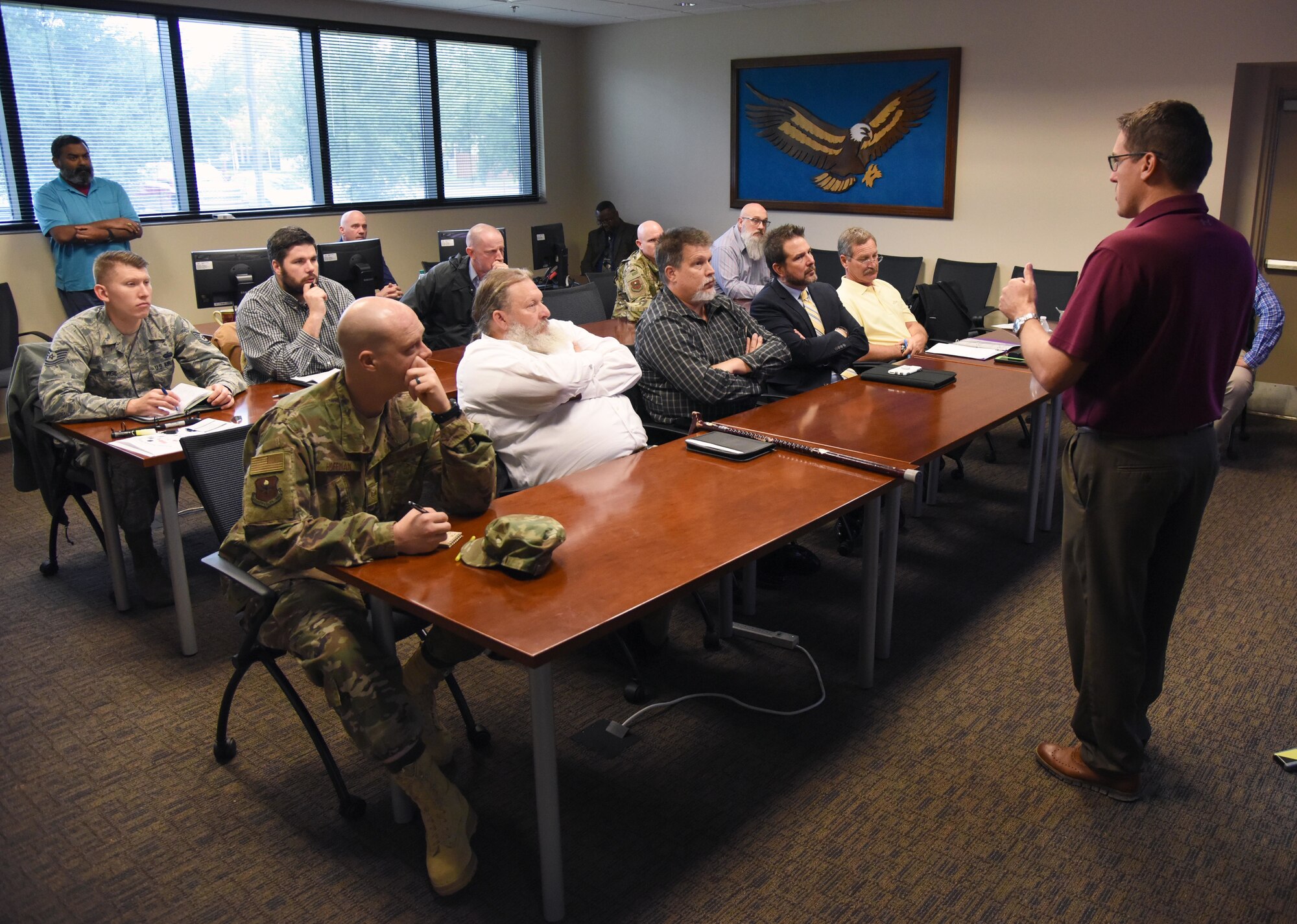 Tomme Lassabe, 81st Training Support Squadron training technology flight chief, briefs on the Trainer Development Center capabilities at Keesler Air Force Base, Mississippi, Nov. 13, 2018. Personnel from Goodfellow AFB, Texas, and Vandenberg AFB, California, visited squadrons within the 81st Training Group to review methodologies currently being used in the 81st TRG course curriculum. (U.S. Air Force photo by Kemberly Groue)