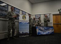 354th Fighter Wing Airmen standby an information booth at an Interior Alaska Industry Day event in Fairbanks, Alaska, Nov. 14, 2018. The 354th Contracting Squadron brought several contracting officers, as well as legal and finance officers to the event in order to promote open and transparent information sharing. (U.S. Air Force photo by Capt. Kay M. Nissen)