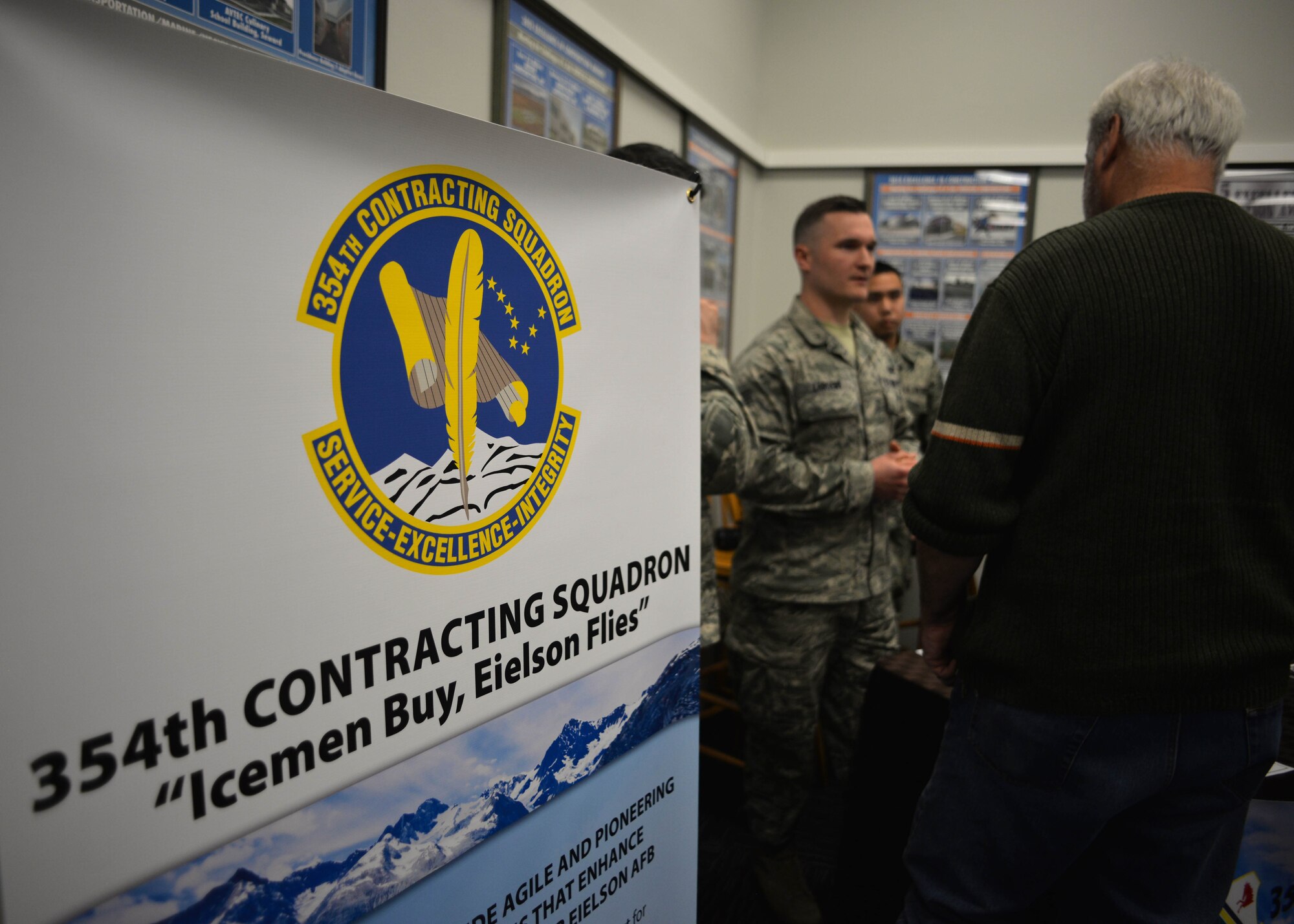 354th Fighter Wing Airmen speak with Alaskan business owners during an Interior Alaska Industry Day held in Fairbanks, Alaska, Nov. 14, 2018. This past year, the 354th Contracting Squadron has awarded nearly 80% of all contract dollars to Alaskan businesses. (U.S. Air Force photo by Capt. Kay M. Nissen)