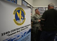 354th Fighter Wing Airmen speak with Alaskan business owners during an Interior Alaska Industry Day held in Fairbanks, Alaska, Nov. 14, 2018. This past year, the 354th Contracting Squadron has awarded nearly 80% of all contract dollars to Alaskan businesses. (U.S. Air Force photo by Capt. Kay M. Nissen)