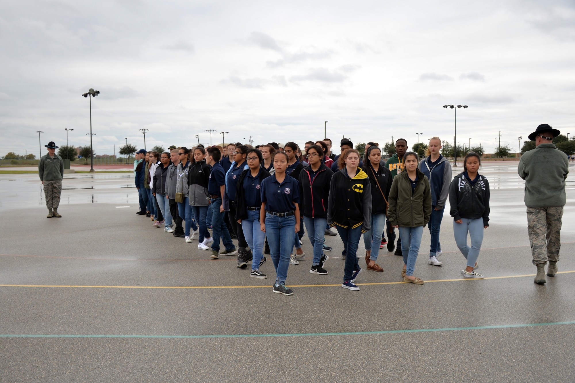 Senior Master Sgt. Jason B. Wagner and Master Sgt. Robert E. Elliott, 433rd Training Squadron military training instructors, instruct Rowlett High School Air Force Junior Reserve Officer’s Training Corps cadets on drill movements at Joint Base San Antonio-Lackland, Texas Nov. 9, 2018.