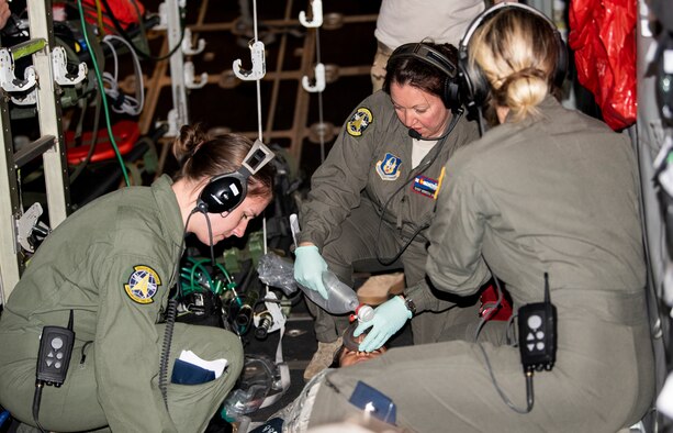 Reserve Citizen Airmen with the 34th Aeromedical Evacuation Squadron practice medical care procedures during a training exercise at Peterson Air Force Base, Colorado, June 27, 2018.