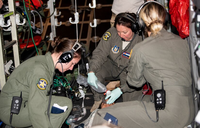 Reserve Citizen Airmen with the 34th Aeromedical Evacuation Squadron practice medical care procedures during a training exercise at Peterson Air Force Base, Colorado, June 27, 2018.