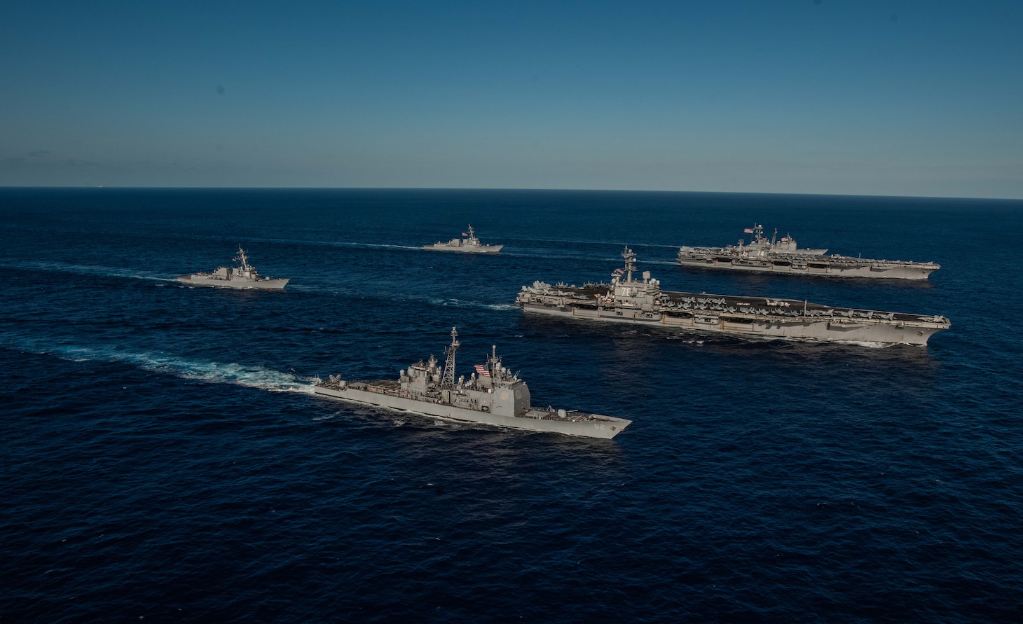 PHILIPPINE SEA (Nov. 16, 2018) Ships with the Ronald Reagan Carrier Strike Group and John C. Stennis Carrier Strike Group transit the Philippine Sea during dual carrier operations. Ronald Reagan and John C. Stennis are underway and conducting operations in international waters as part of a dual carrier strike force exercise. The U.S. Navy has patrolled the Indo-Pacific region routinely for more than 70 years promoting regional security, stability and prosperity.