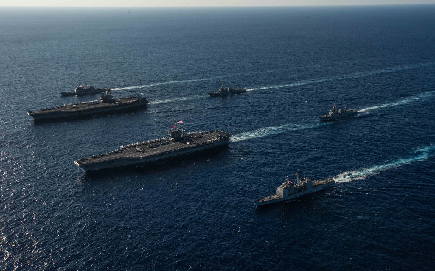PHILIPPINE SEA (Nov. 16, 2018) Ships with the Ronald Reagan Carrier Strike Group and John C. Stennis Carrier Strike Group transit the Philippine Sea during dual carrier operations. Ronald Reagan and John C. Stennis are underway and conducting operations in international waters as part of a dual carrier strike force exercise. The U.S. Navy has patrolled the Indo-Pacific region routinely for more than 70 years promoting regional security, stability and prosperity.
