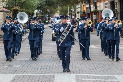 Members from the Air Force Band of the West march and perform in the Veterans Day parade in San Antonio Nov. 10. The event was held to honor veterans and current active duty Soldiers, Airmen, Sailors, Coast Guardsmen and Marines.