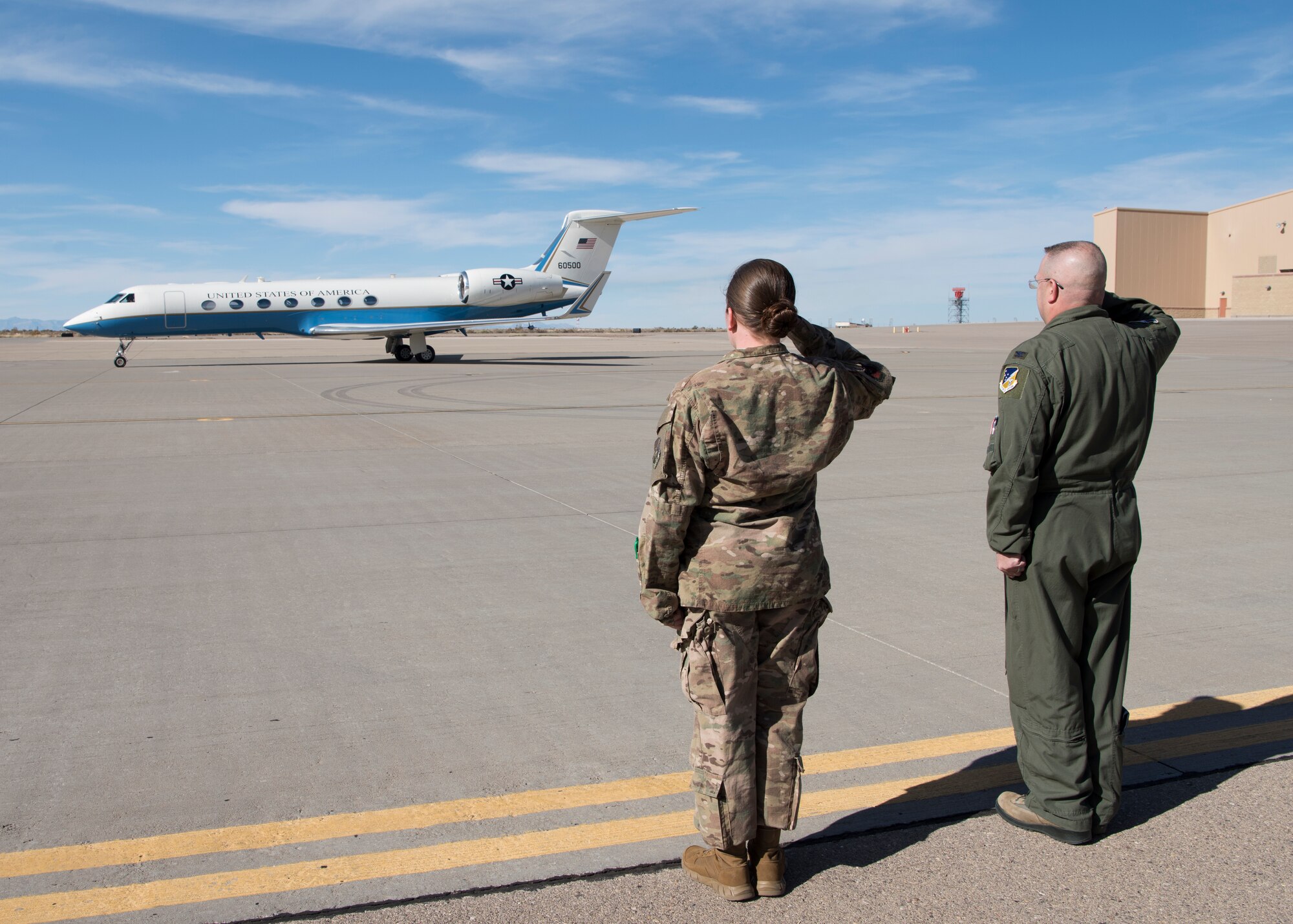 Col. Michael Boger, 54th Fighter Group commander and Tech. Sgt. Whitney O’Neill, 49th Wing protocol specialist, salute as Gen. Paul Selva, vice chairman of the Joint Chiefs of Staff, departs Holloman Air Force Base, N.M., November 14, 2018. Selva visited Holloman and White Sands Missile Range November 13 to 14. (U.S. Air Force photo by Staff Sgt. BreeAnn Sachs).