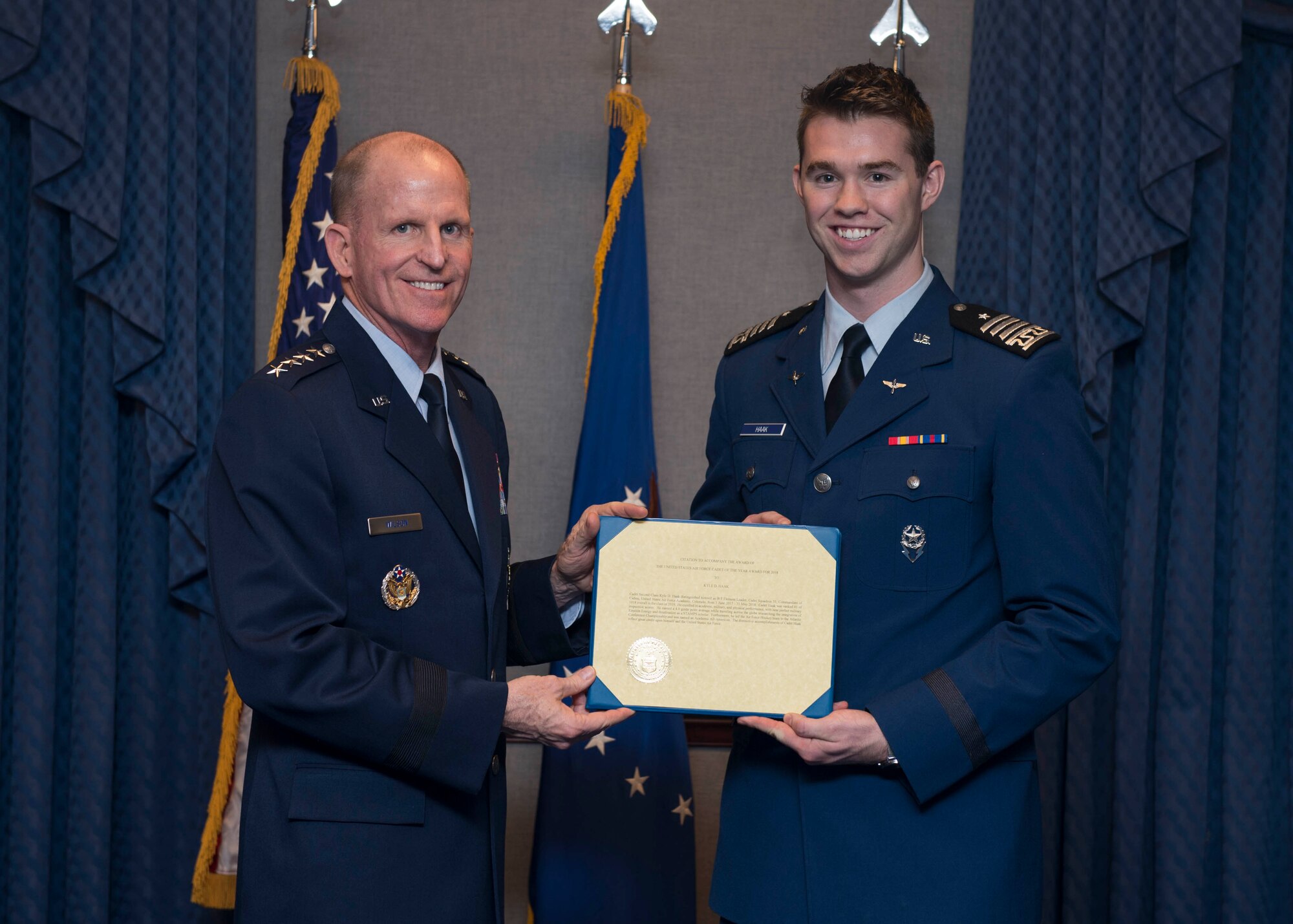Cadet 2nd Class Kyle Haak receives the 2018 U.S. Air Force Cadet of the Year award from Air Force Vice Chief of Staff Gen. Stephen V. Wilson during a ceremony at the Pentagon, Arlington, Va., Nov. 6, 2018. Established in 2000 by the private British Air Squadron organization, the award is a symbol of the enduring British-American friendship. (U.S. Air Force photo by Staff Sgt. Victoria H. Taylor)