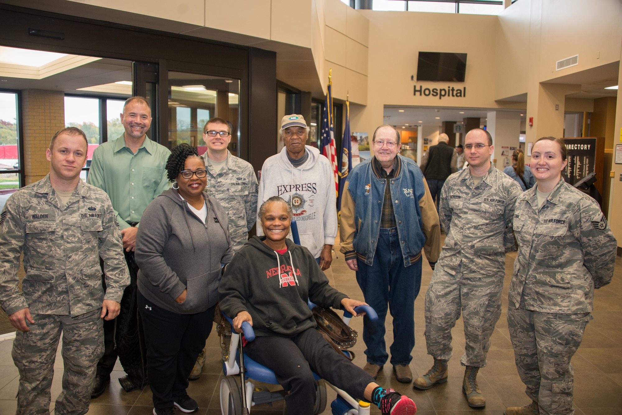 Airmen from the 2nd Weather Support Squadron pose for a group photo with patients at the Omaha VA Medical Center in Omaha, Nebraska, Oct. 26, 2018. The squadron chose to visit with veterans as part of Offutt Air Force Base’s Wingman Day, which is designed to build resiliency through teambuilding activities. (U.S. Air Force photo by Paul Shirk)