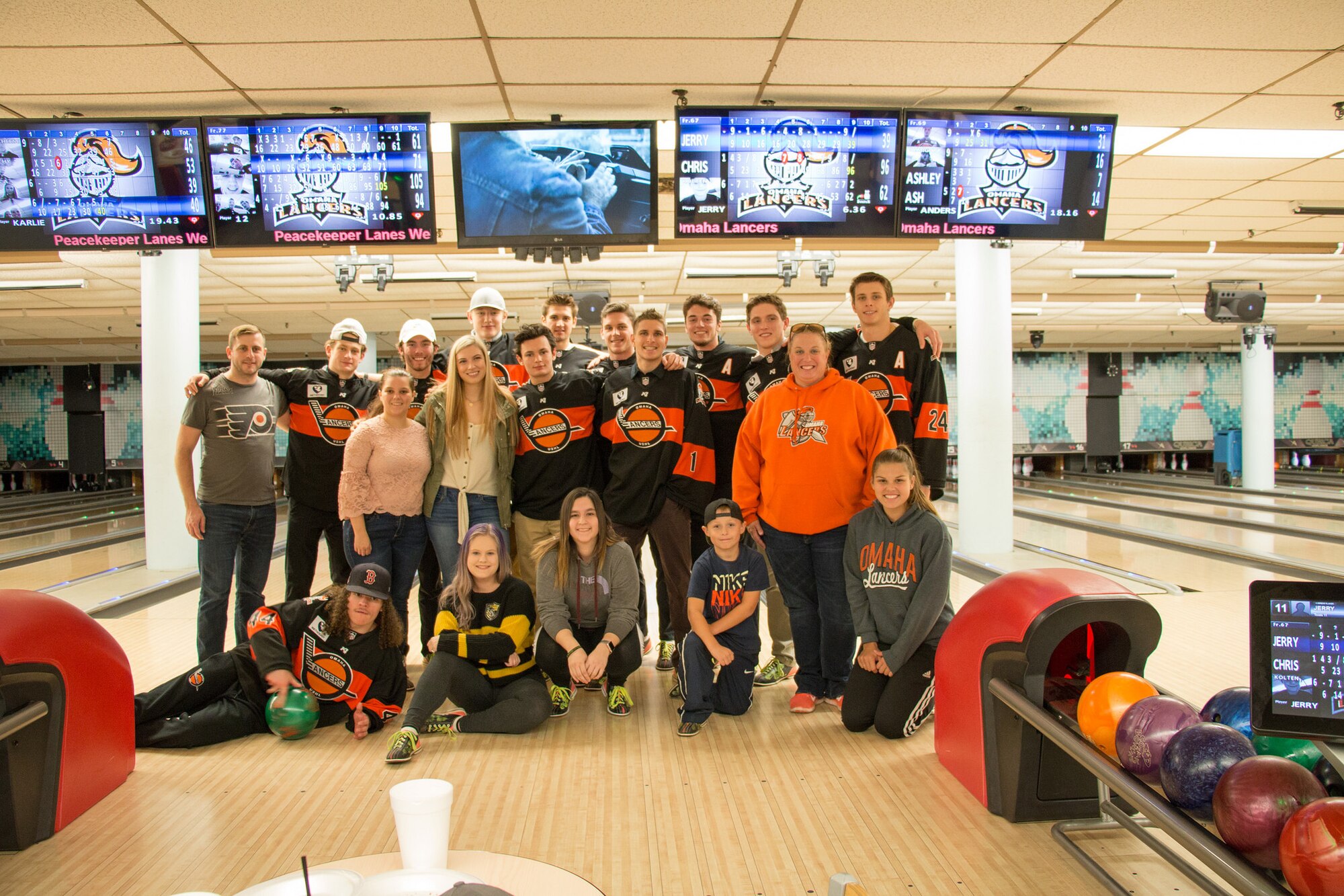 The Omaha Lancers pose for a photo with a group of fans at Peacekeeper Lanes on Offutt Air Force Base, Nebraska. The Lancers recently celebrated Veterans Day by hosting its inaugural Offutt Air Force Base Night at Ralston Arena. (Courtesy photo)