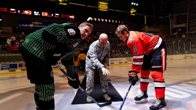 U.S. Air Force Col. Mike Manion drops the puck during the Omaha Lancers' inaugural Offutt Air Force Base Night at Ralston Arena, Nov. 11, 2018. The Lancers continued on to beat the Cedar Rapids RoughRiders 5-4 (Courtesy photo)