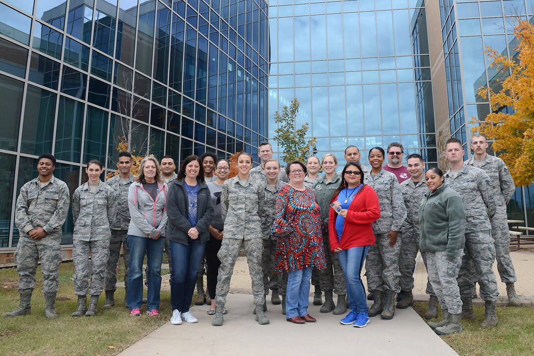 4A technicians and Medical Service Corps officers with the 72nd Medical Support Squadron gathered for a group photo in celebration of their annual 4A and MSC Appreciation Week on Nov. 2. Approximately 120 people within the 72MDSS serve as medical administrative technicians, logisticians, biomedical equipment technicians, information technology, resource management, healthcare management and TRICARE operations within the 4A/MSC field here at Tinker in the 72nd Medical Group.