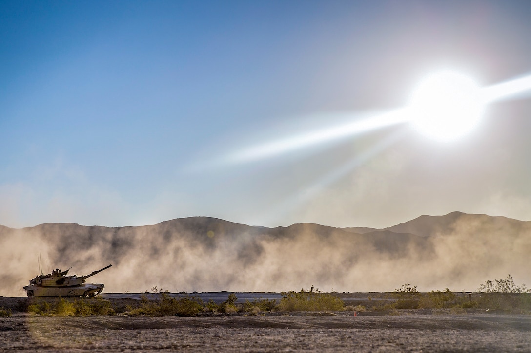 A tank patrols an empty valley.