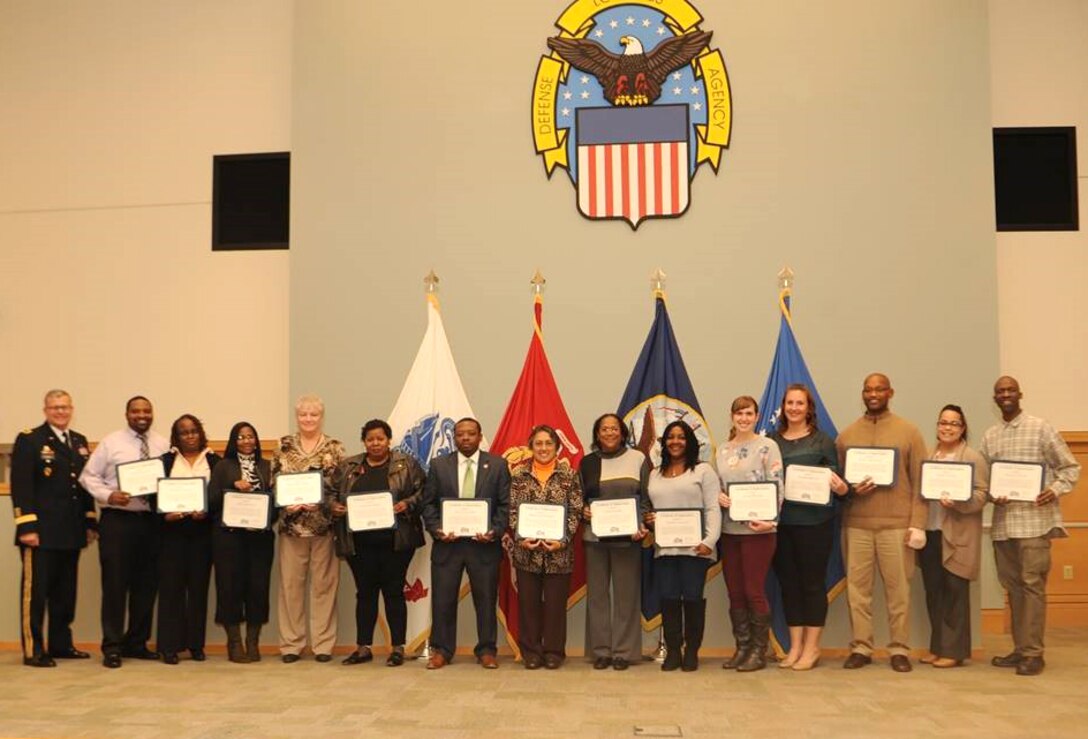 Employees receive recognition awards
