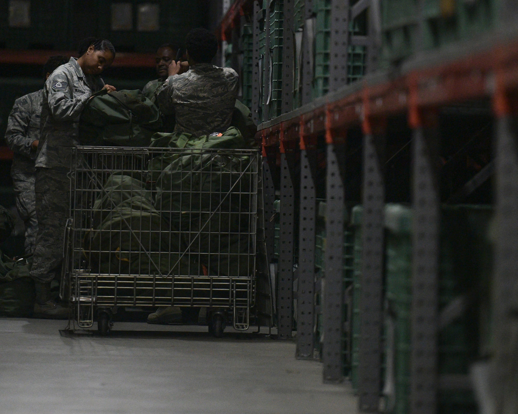 628th Logistics Readiness Squadron Airmen prepare mobility bags during a readiness exercise Nov. 12, 2018 at Joint Base Charleston, S.C. To keep the training as realistic as possible, participants from across JB Charleston received the equipment, weapons and specialty uniform items they would use in real-world situations. The simulated scenarios enabled senior base leaders and subject matter experts to ensure the readiness of JB Charleston’s quick response capabilities.