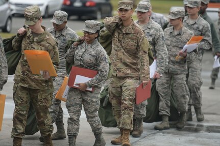 A group of Airmen prepare for a mock deployment during an operational readiness exercise Nov. 12, 2018, at Joint Base Charleston, S.C. To keep the training as realistic as possible, participants from across JB Charleston received the equipment, weapons and specialty uniform items they would use in real-world situations. The simulated scenarios enabled senior base leaders and subject matter experts to ensure the readiness of JB Charleston’s quick response capabilities.