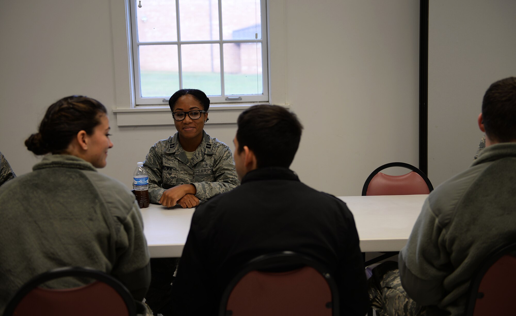 Capt. Amessia Brown, 14th Medical Operations Squadron Public Health Flight commander, talks with Mississippi State University Air Force ROTC cadets Nov. 9, 2018, at the BLAZE Chapel on Columbus Air Force Base, Mississippi. Columbus AFB hosted a career day inside the BLAZE Chapel annex for cadets to see firsthand how an operational base works and obtain a better understanding of the interactions within each career field. (U.S. Air Force photo by Airman Hannah Bean)