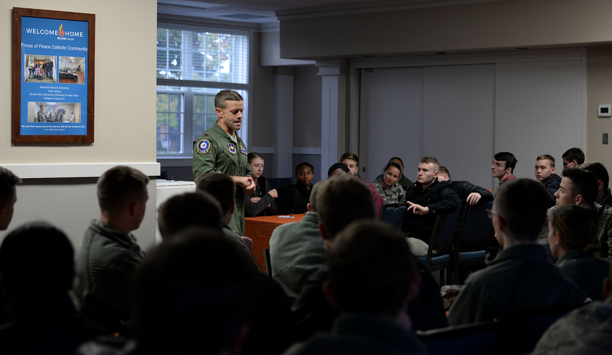 Col. William Denham, 14th Flying Training Wing vice wing commander, talks with Mississippi State University Air Force ROTC cadets Nov. 9, 2018, at the BLAZE Chapel on Columbus Air Force Base, Mississippi. Denham thanked the students for visiting Columbus AFB, adding that whatever career they decide to join, there will be incredible opportunities for them while executing the mission of the greatest Air Force in the world. (U.S. Air Force photo by Airman Hannah Bean)
