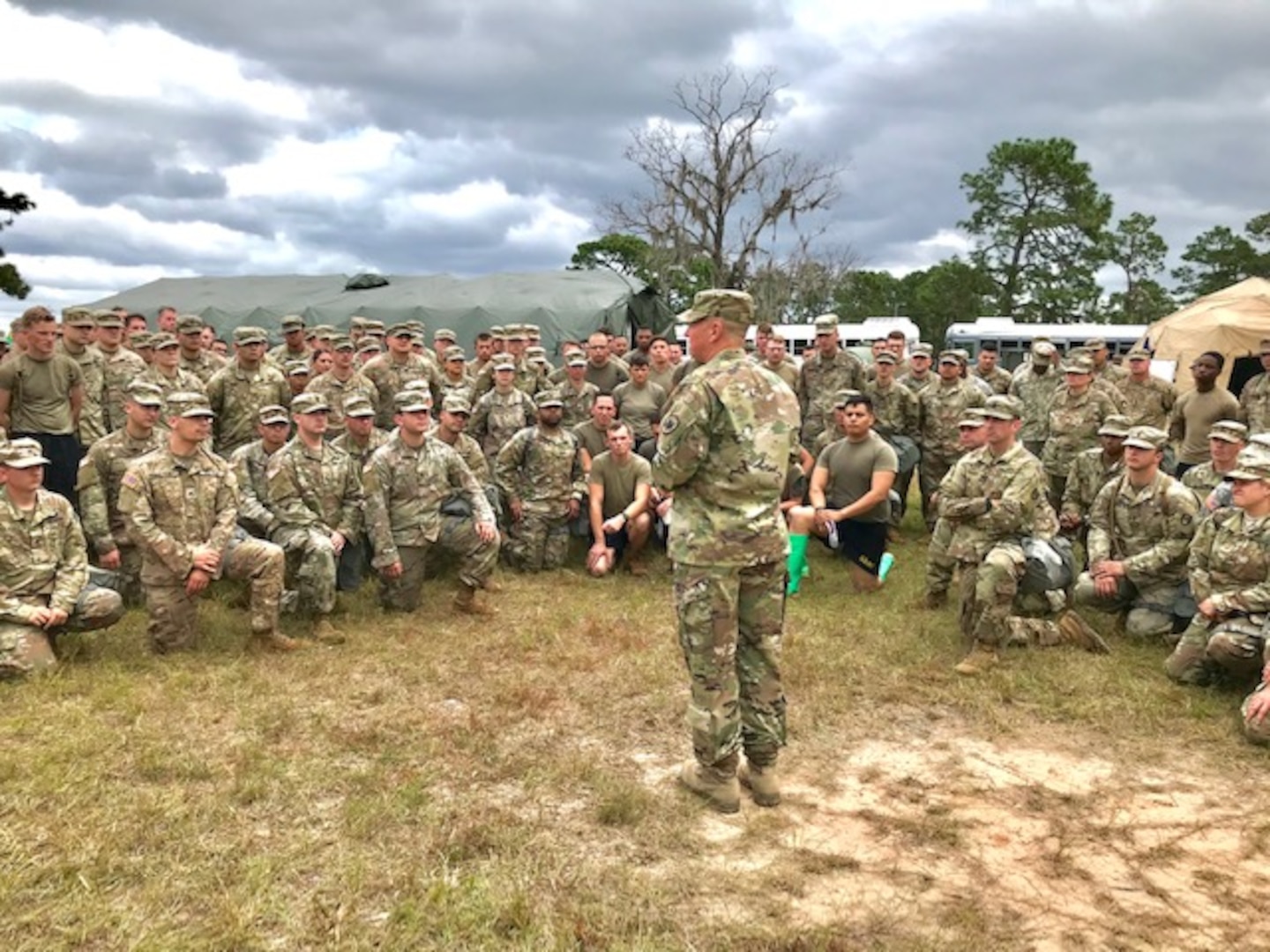 Army Maj. Gen. William “Bill” Hall, commander, Joint Task Force Civil Support, talks with Soldiers and Airmen of the 503rd Military Police Battalion during their recent field training exercise (FTX) at Camp Blanding, Fla., on Oct. 24, 2018. The 503rd is a subordinate battalion that falls under Task Force Operations, one of the major task forces that make up the Defense Chemical, Biological, Radiological and Nuclear Response Force (DCRF). It is part of a 5,200-personnel team that extends across 30 bases throughout the United States ready for any a crises response. The FTX provided various skilled training in search & rescue and emergency medical treatment. (Courtesy photo by Navy Chief Petty Officer Zach McKinley)