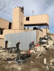 Members of the 22nd Engineer Company work to remove rubble and construction hazards from a simulated building collapse during their recent field training exercise (FTX) at Camp Blanding, Fla., on Oct. 24, 2018. The Army unit is part of a 5,200-personnel team that extends across 30 bases throughout the United States ready to respond to catastrophic CBRN events. (Courtesy photo by Navy Chief Petty Officer Zach McKinley)