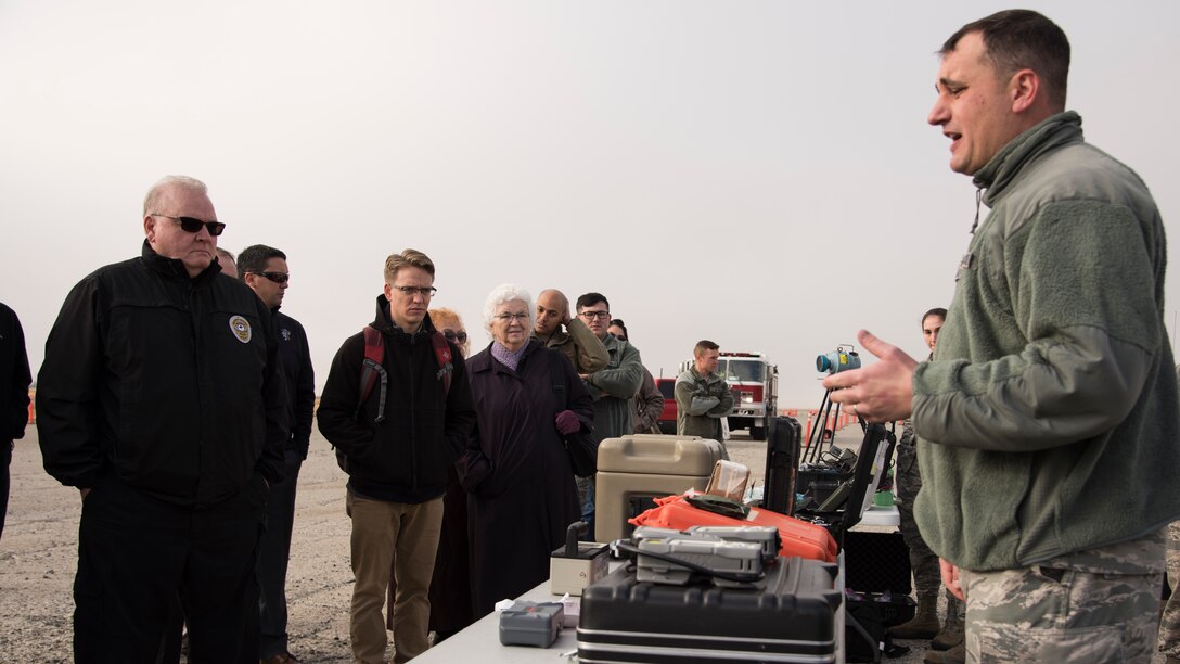 Tech. Sgt. Alfred Esposito, 92nd Civil Engineering Squadron Emergency Management craftsman, discusses specialized, networked detectors and tools Team Fairchild emergency responders could use in the event of a hazardous material incident during a demonstration for members of the Spokane Local Emergency Planning Committee at Fairchild Air Force Base, Washington, Nov. 7, 2018. Federal and state agencies, by law, require specialized "mutual aid agreements" to outline the situations in which both federal and state agencies may assist one another during an emergency situation. (U.S. Air Force Photo/ Senior Airman Ryan Lackey)