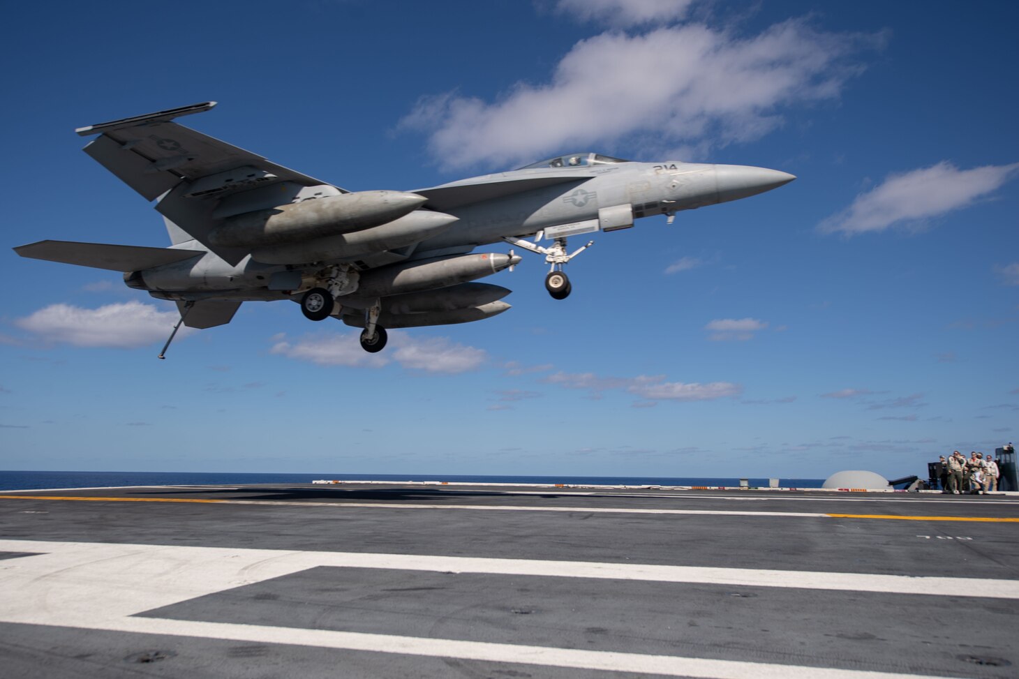 PHILIPPINE SEA (Nov. 16, 2018) An F/A-18E Super Hornet, with Strike Fighter Squadron (VFA) 14, prepares to land on the flight deck aboard the Nimitz-class aircraft carrier USS John C. Stennis (CVN 74). John C. Stennis is underway and conducting operations in international waters as part of a dual carrier strike force exercise. The U.S. Navy has patrolled the Indo-Pacific region routinely for more than 70 years promoting regional security, stability and prosperity.