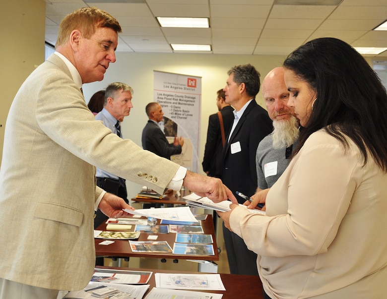 Representatives with the U.S. Army Corps of Engineers Los Angeles District meet with potential business partners during the District’s annual Business Opportunities Open House Nov. 13 at the District’s Headquarters building in downtown Los Angeles. More than 125 business representatives attended the event, seeking opportunities to do work for the Corps.