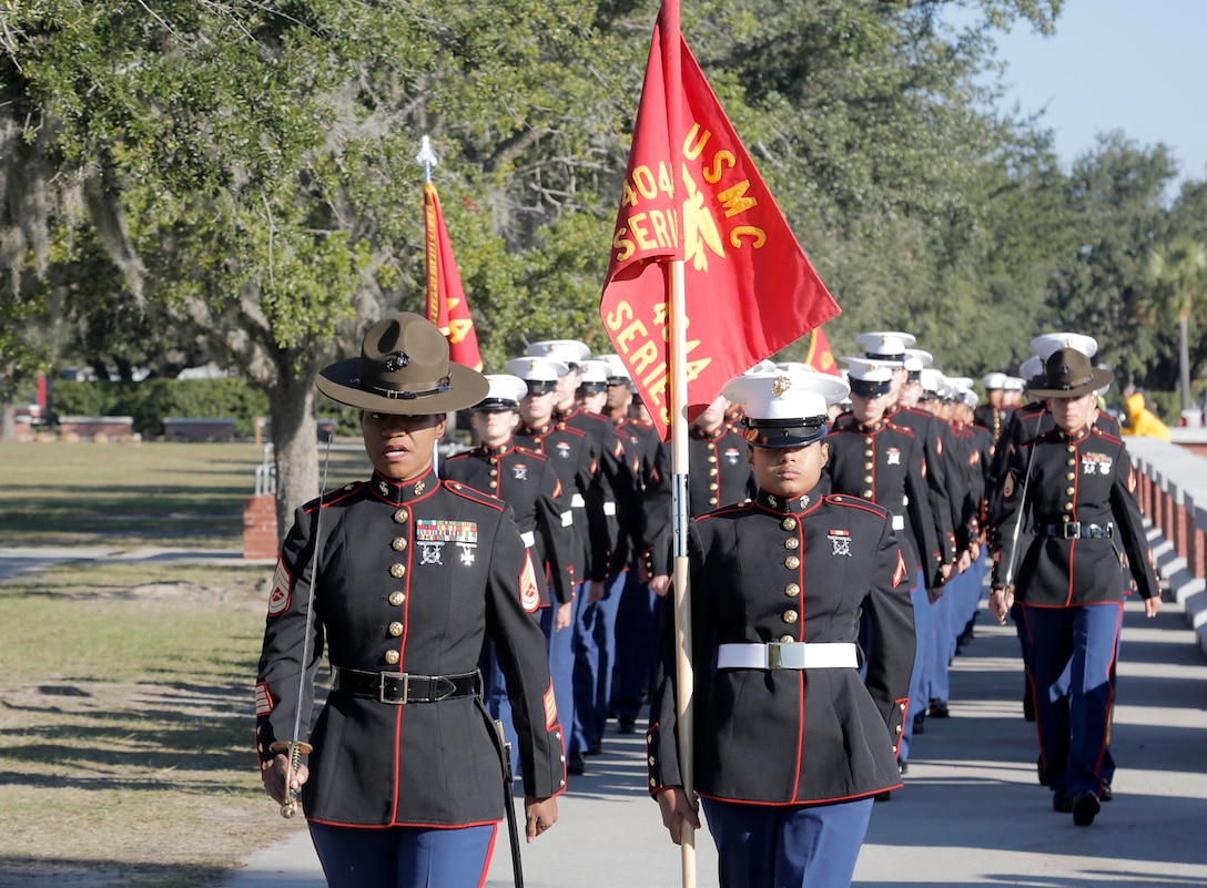Drill Instructors and Marines with November Company, 4th Recruit Training Battalion march towards the Peatross Parade Deck before their graduation ceremony Nov. 16, 2018 at Marine Corps Recruit Depot Parris Island, S.C.