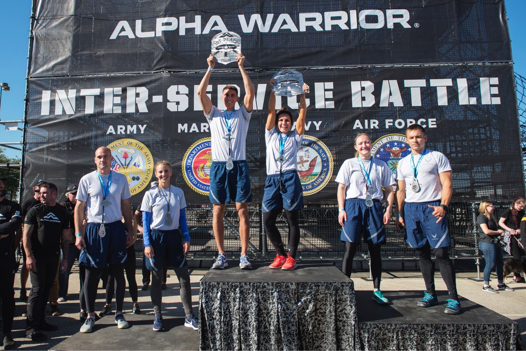 Winners from the 2018 Air Force Alpha Warrior Final Battle pose for photos during the awards ceremony, Friday, November 16, 2018 at the Alpha Warrior Proving Grounds, Retama Park, Selma, Texas.