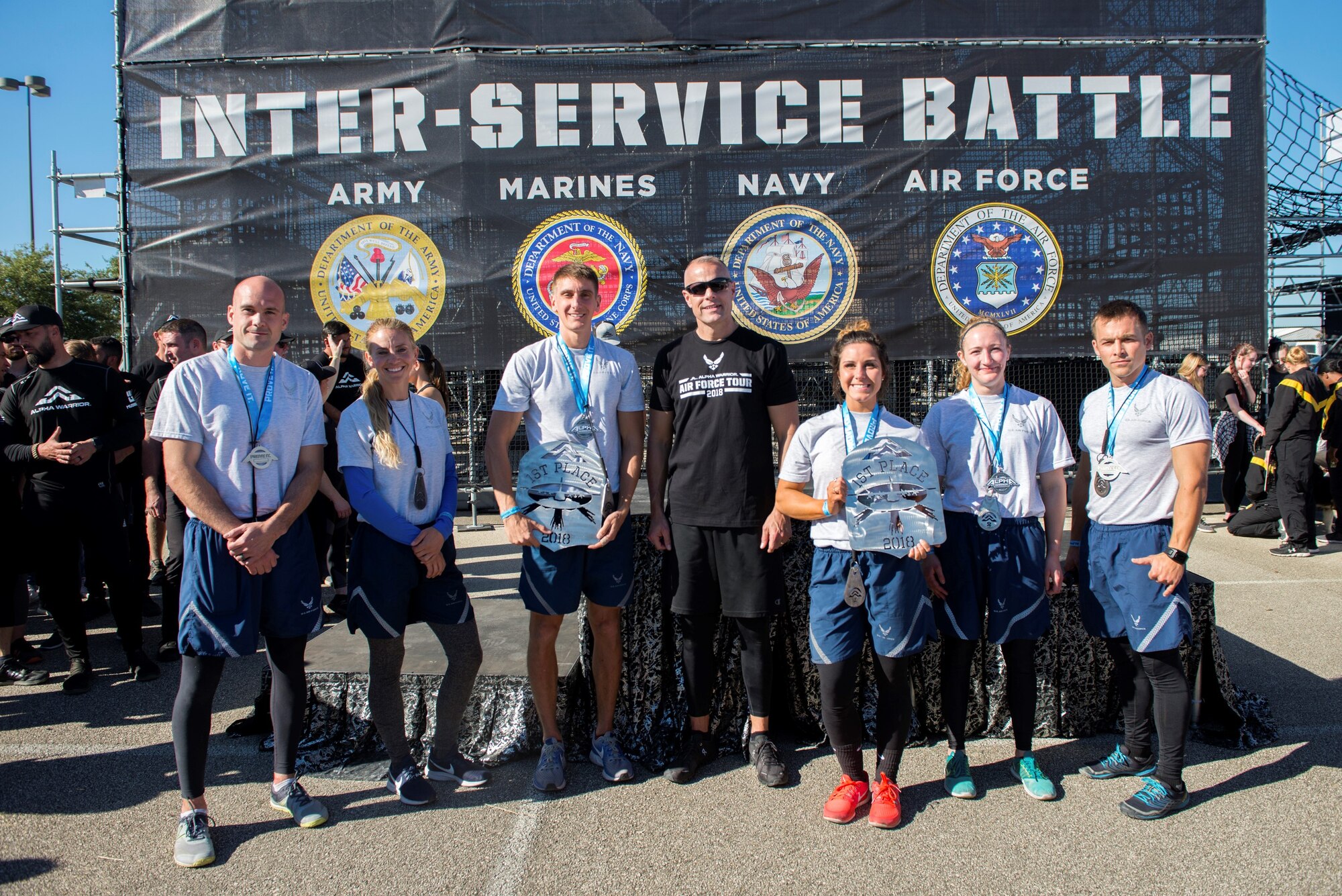 Winners from the 2018 Air Force Alpha Warrior Final Battle pose for photos during the awards ceremony, Friday, November 16, 2018 at the Alpha Warrior Proving Grounds, Retama Park, Selma, Texas.