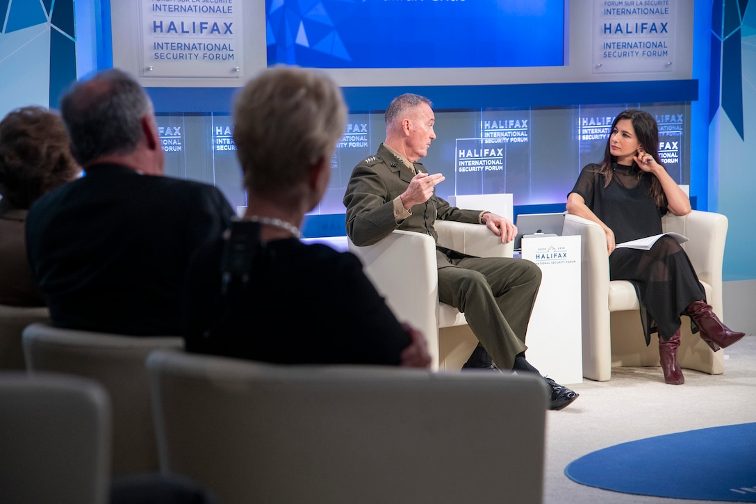 Marine Corps Gen. Joe Dunford, center, chairman of the Joint Chiefs of Staff, is interviewed by BBC World News presenter Yalda Hakim during the Halifax International Security Forum, taking place in Canada.