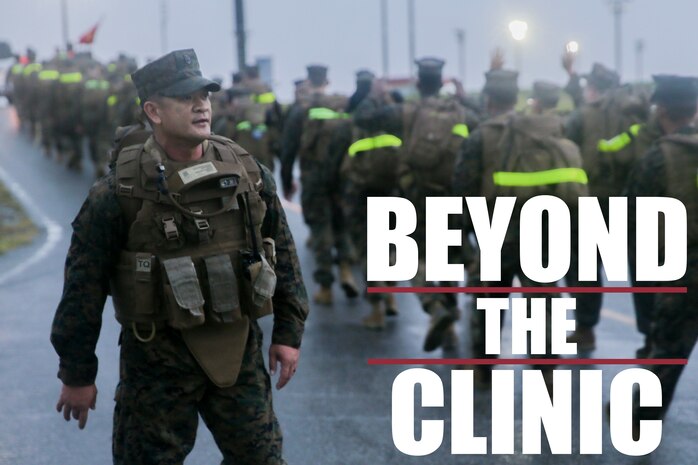 Master Chief Leonardo E. Carbonel motivates Sailors with 3rd Dental Battalion, 3rd Marine Logistics Group, during a 3-mile hike Nov. 16, 2018 at Camp Hansen, Okinawa, Japan. 3rd Dental Battalion Sailors participated in a 3-mile conditioning hike to simulate hiking with deployed Marines and traveling to a Role II facility, as well as conducting Tactical Combat Casualty Care upon arrival. Carbonel, a native of Lemoore, California, is the command master chief for 3rd Dental Battalion. (U.S. Marine Corps photo by Lance Cpl. Armando Elizalde)