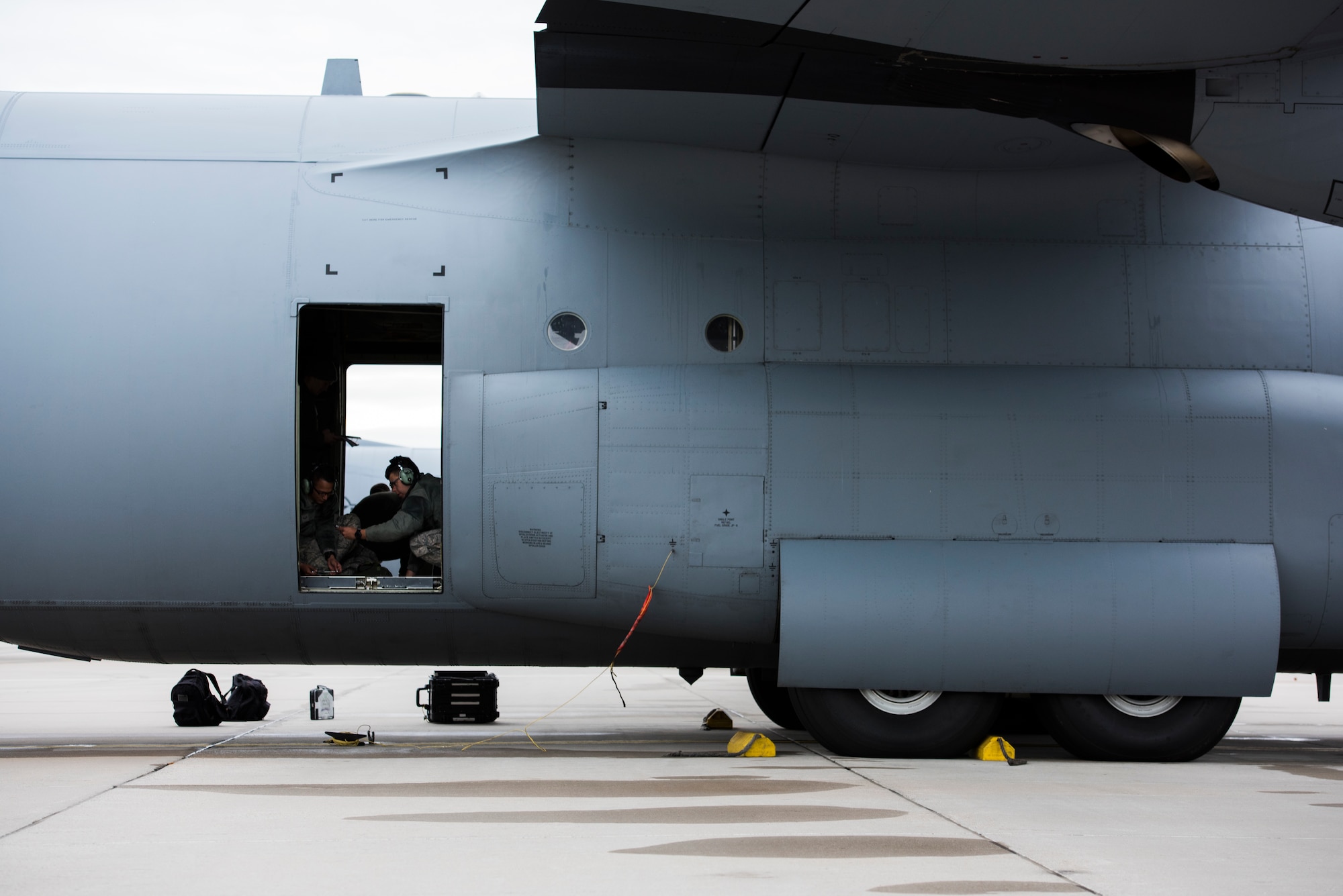 U.S. Air Force crew chiefs assigned to the 86th Aircraft Maintenance Squadron prepare a C-130J Super Hercules aircraft on Ramstein Air Base, Germany Oct. 31, 2018. Crew chiefs partake in all maintenance that occurs prior to the aircraft being noted as air-worthy. (U.S. Air Force photo by Senior Airman Devin M. Rumbaugh)