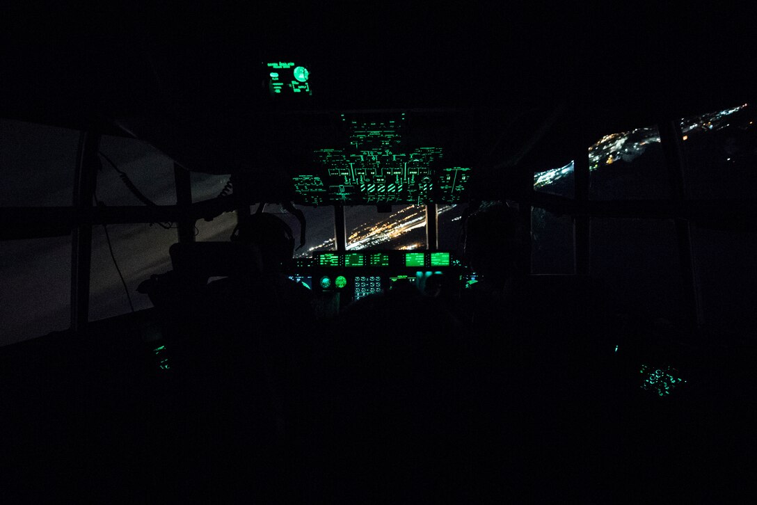 U.S. Air Force Lt. Col. Jonathan Cato, 37th Airlift Squadron commander, and U.S. Air Force Capt. Andrew Forsyth, 37th AS pilot, fly a C-130J Super Hercules aircraft over Ramstein Air Base, Germany, Nov. 8, 2018. The sortie was part of a mass generation exercise. (U.S. Air Force photo by Senior Airman Devin M. Rumbaugh)