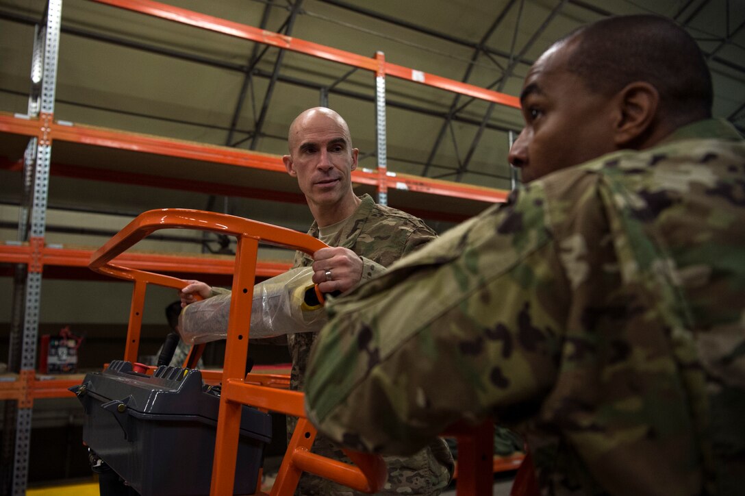 U.S. Air Force Col. Jason Bailey, 52nd Fighter Wing commander, left, and Chief Master Sgt, Alvin Dyer, 52nd FW command chief, right, tour a supply warehouse at Ghedi Air Base, Italy, Nov. 15, 2018. Ghedi is an Italian air force base home to the 6th Stormo Italian air force and U.S Air Force 704th Munitions Support Squadron. Leadership from Spangdahlem Air Base, Germany, visited the 704th MUNSS and toured the complex to get a better understanding of 52nd FW geographically separated unit operations. (U.S. Air Force photo by Airman 1st Class Valerie Seelye)