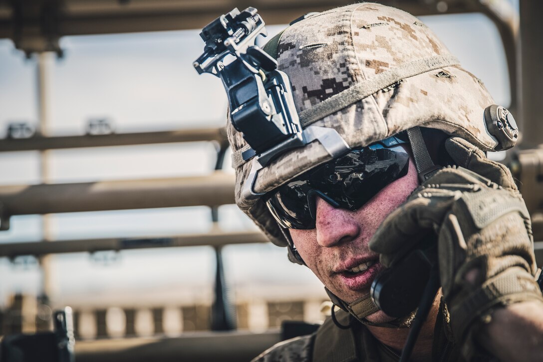 Lance Cpl. Andrew Tocko, a low altitude air defense gunner with Marine Medium Tiltrotor Squadron 163,11th Marine Expeditionary Unit, operates a radio from a Light Marine Air Defense Integrated System at Marine Corps Air Ground Combat Center Twentynine Palms, Calif., Nov. 13, 2018. The VMM-163 Marines supported Battalion Landing Team 3rd Battalion, 5th Marine Regiment’s operations at the combat center, employing the LMADIS to defeat unmanned aircraft systems via electronic attack.