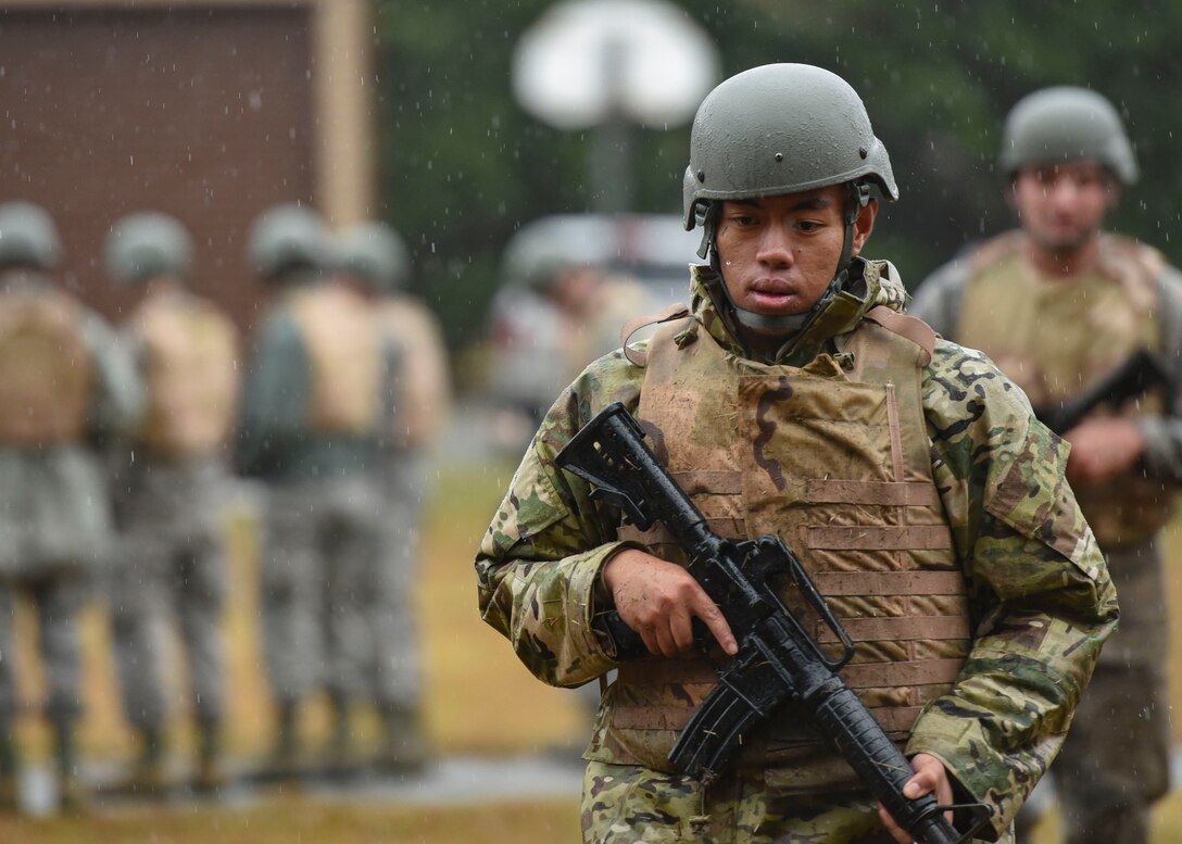 U.S. Air Force Staff Sgt. Joshua Tomada, 633rd Civil Engineer Squadron electrical systems specialist, secures an area during Prime Base Engineer Emergency Force training at Joint Base Langley-Eustis, Virginia, Nov. 15, 2018.