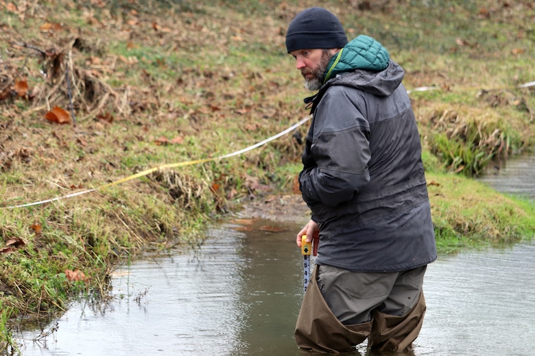 The class stood in frigid water up to their knees to collect measurements to input into the Tennessee Stream Quantification Tool Nov. 14, 2018 at Madison Creek in Goodlettsville, Tenn.  (USACE photo by Ashley Webster)