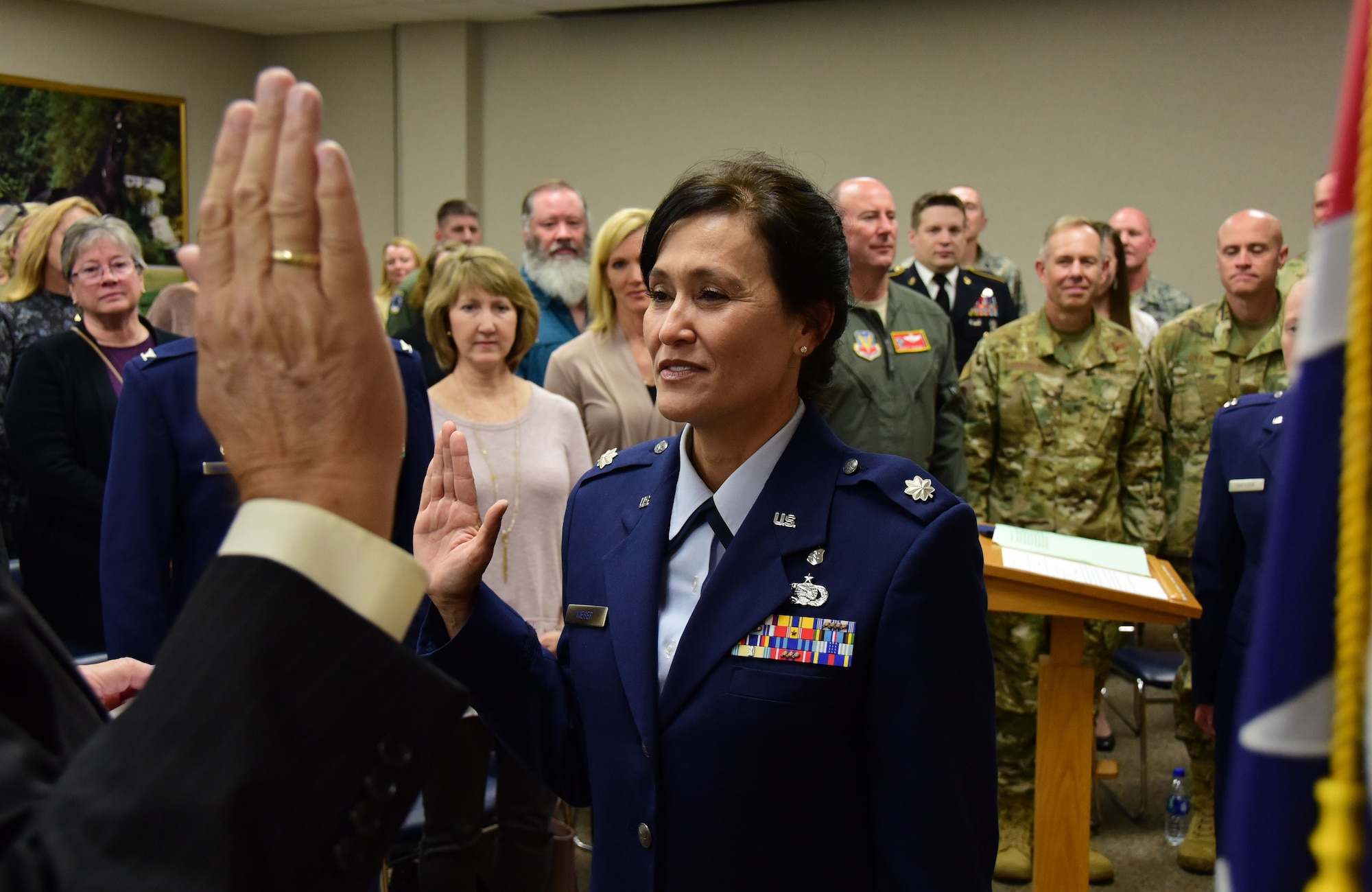 Lt. Col. Linda Kieser, a special projects officer with the 118th Wing, takes the oath of office at her promotion ceremony on Nov. 3, 2018 at Berry Field Air National Guard Base, Nashville, Tennessee.