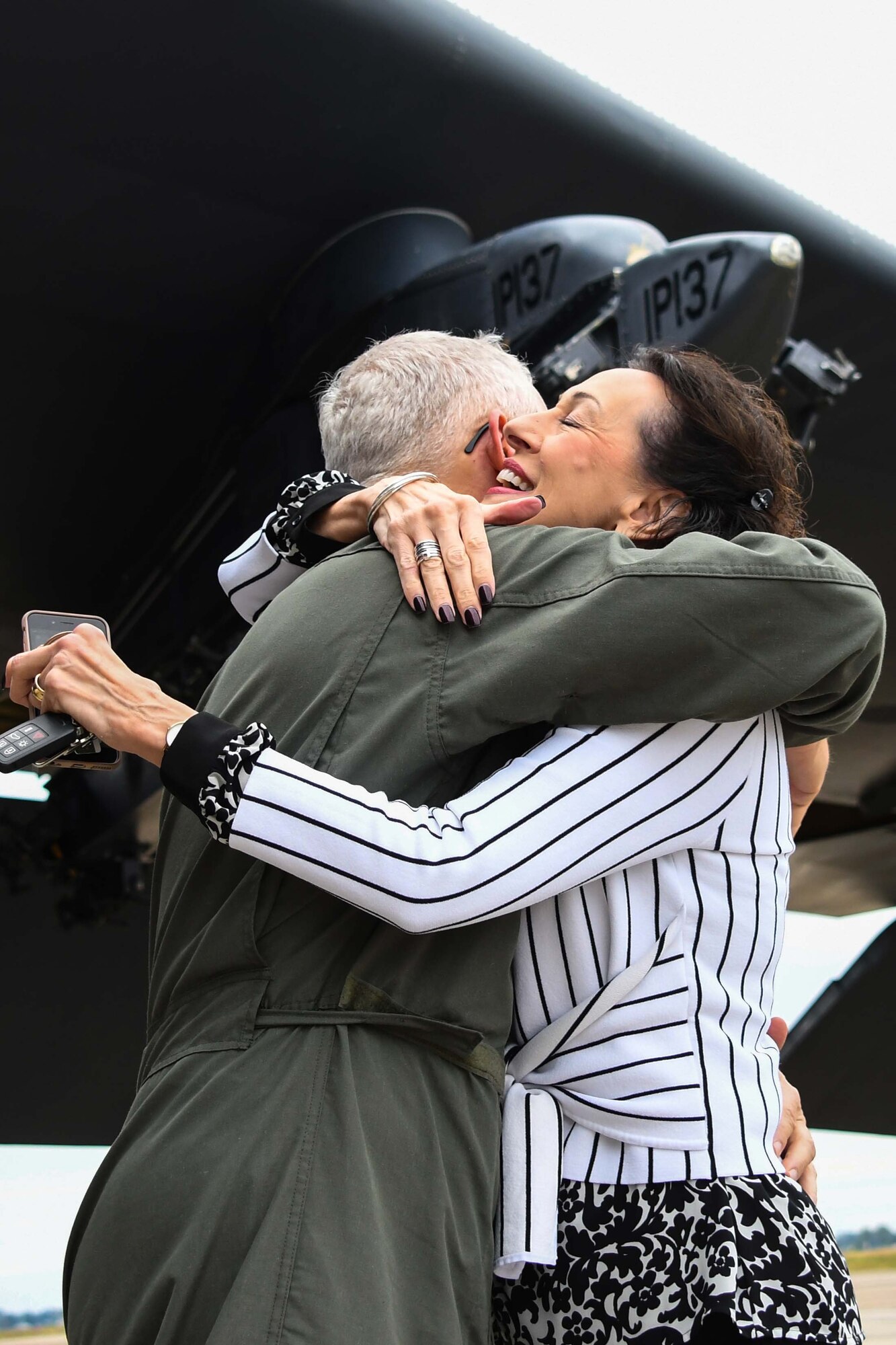 U.S. Air Force Lt. Col. Dwayne Slack, 307th Maintenance Group deputy commander, hugs his wife, Cathi, after completing a flight aboard a B-52 Stratofortress at Barksdale Air Force Base, Louisiana, Jan. 24, 2018.  Slack has served as a Reserve Citizen Airman for more than 30 years, originally enlisting in 1988. (U.S. Air Force photo by Master Sgt. Ted Daigle)